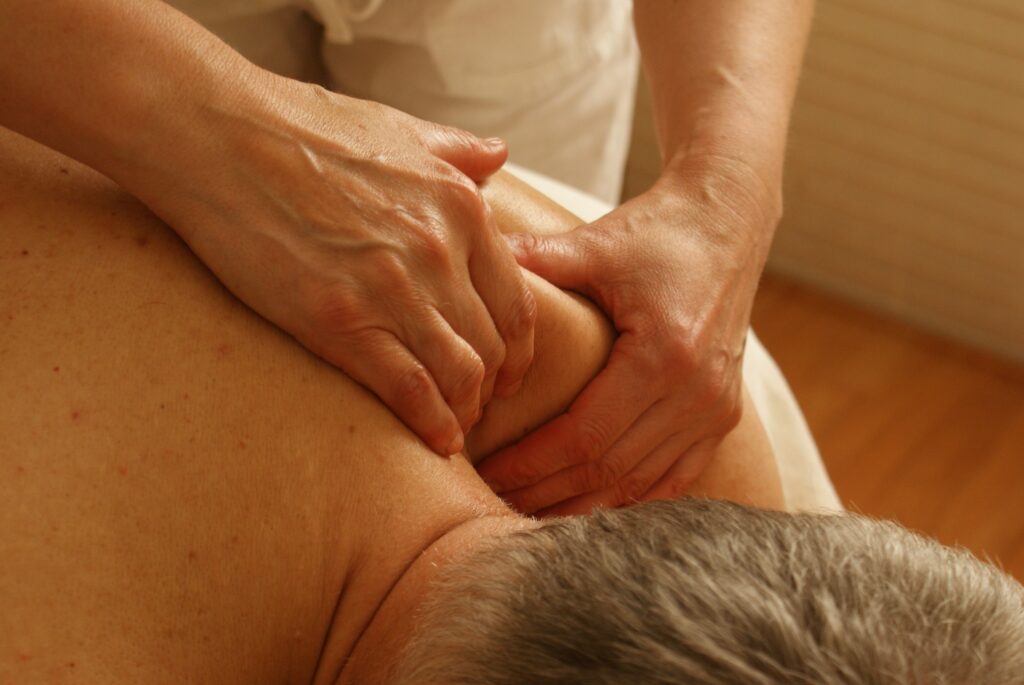 back massage deep tissue trapezius